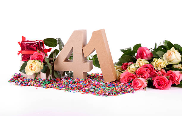 Age in figures, decorated with roses stock photo