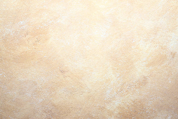 rock abstract beige wall background stock photo