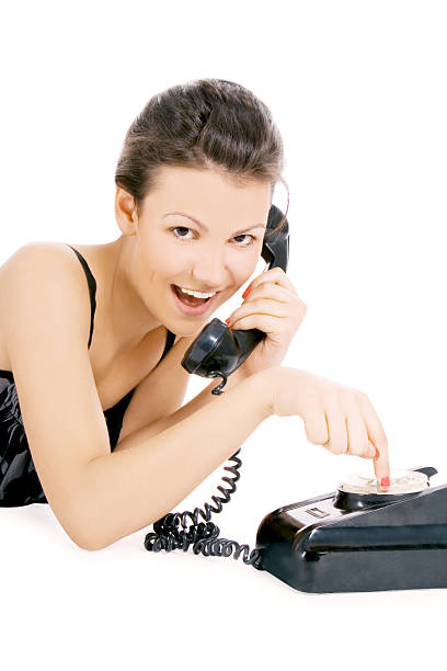 istock young alluring girl calling at the phone 464898257