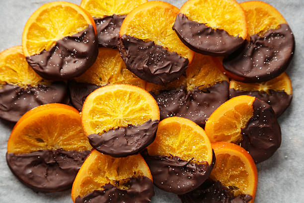 istock Delicious slices of orange coated chocolate 464899708