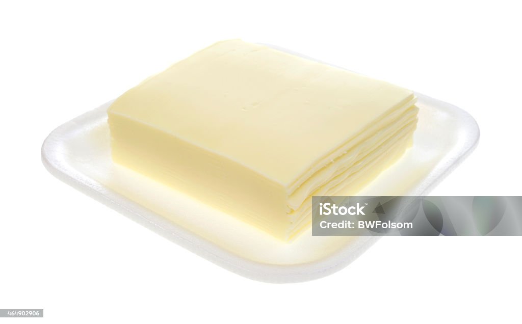 Rodajas De Queso Blanco Americano En Bandeja De Espuma Foto de stock y más banco de imágenes de 2015 - iStock Rodajas De Queso Blanco Americano En Bandeja De Espuma Foto de stock y más banco de imágenes de 2015 - iStock