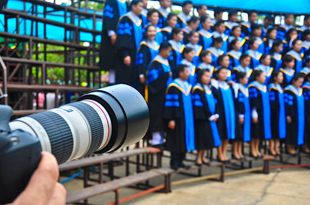 graduation taking a photo for asia graduation graduation photos stock pictures, royalty-free photos & images