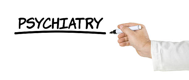 istock Hand with pen writing Psychiatry 464907192