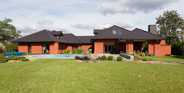 istock Huge mansion with swimming pool 464910267