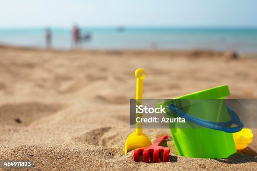 istock Beach toys in the sand 464911823