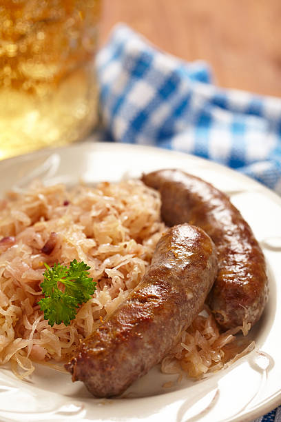 istock grilled bavarian sausages with sauerkraut 464917619