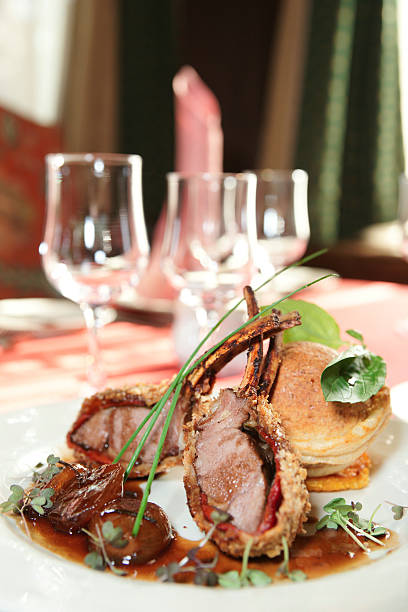 istock Rack of lamb with caramelized onions and bread 464919407