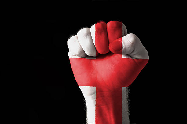 istock Fist painted in colors of england flag 464920748
