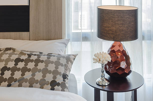 istock brown modern lamp design on round wooden table 464921074