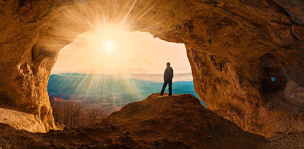 Cтоковое фото Человек mainsails и пещеры