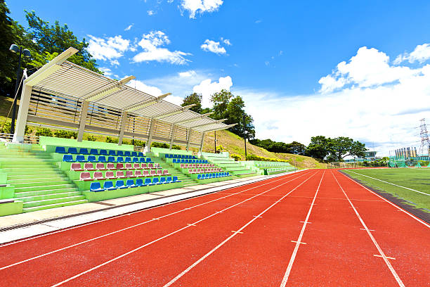 istock Running track in sports ground 464925557