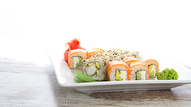 istock Seafood Maki sushi in white plate isolated on white background 464930648
