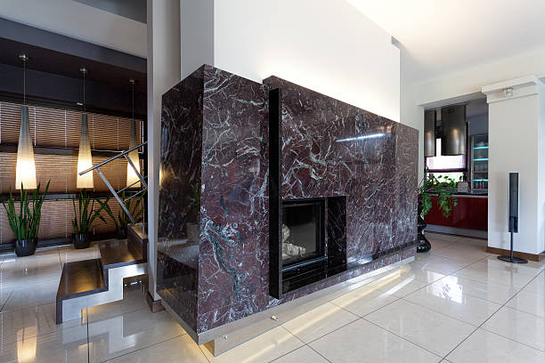 istock Stone fireplace in living room 464931847