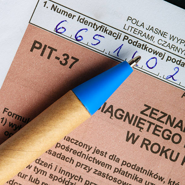 istock Filling in polish individual tax form PIT-37 for year 2013 464933357