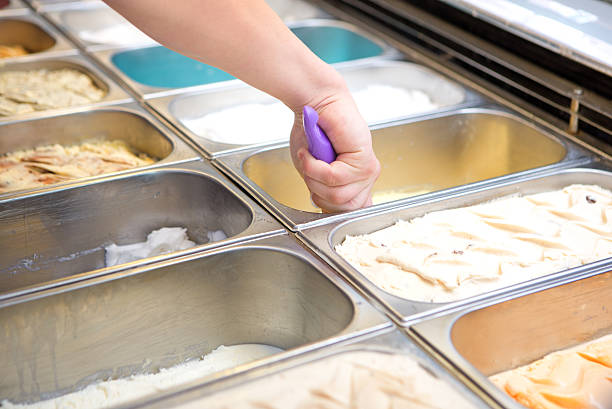 istock seller serving ice-cream 464934328
