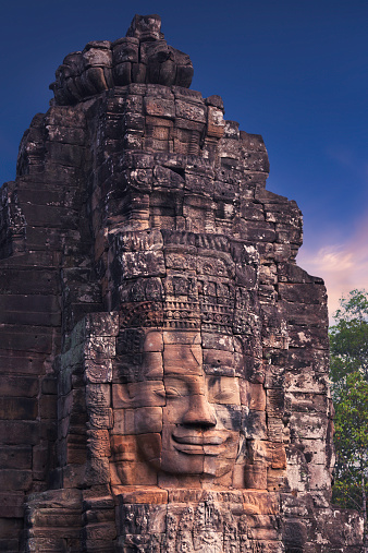 A stone face of the Bayon temple in Angkor, Cambodia.