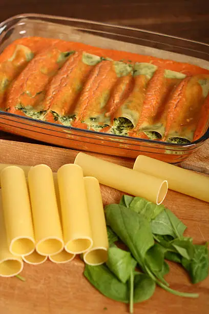 Making Cannelloni verdi. Pasta with spinach and ricotta.