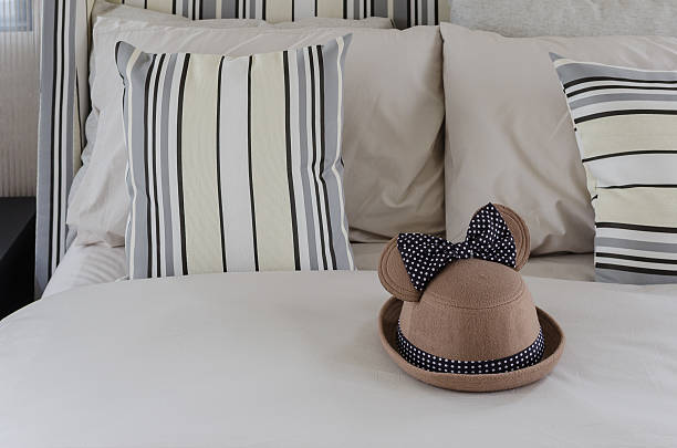 istock brown hat on bed with pillows in bedroom 464937506