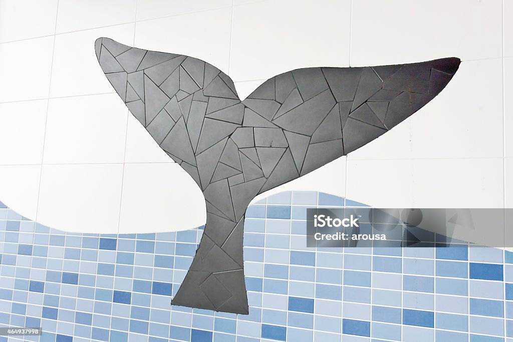 Whale tail mosaic Decorative mosaic of whale tail on the wall of a building 2015 Stock Photo