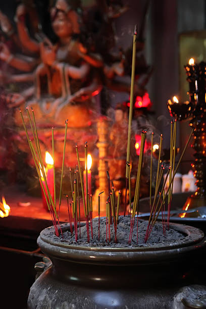 istock Incense sticks in a buddhist temple 464939179