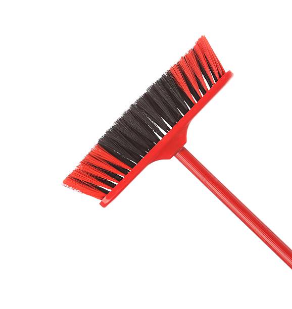 Close up of red black broom.