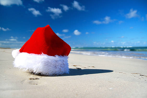 istock Santa claus hat on caribbean sea 464940229