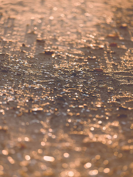 istock abstract shiny rocks on the beach - vintage retro effect 464942660