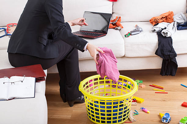 istock Active woman cleaning house and working 464945563