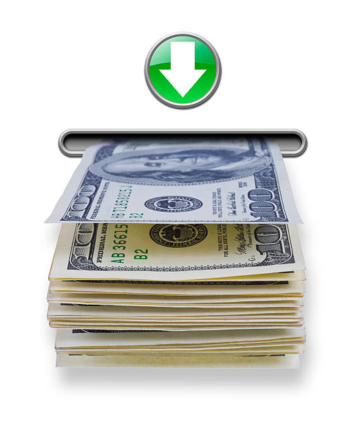 US dollar money stack dispensed from ATM cash machine stock photo