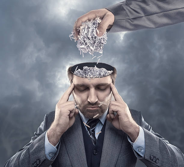 istock Man with paper in his brain 464947030