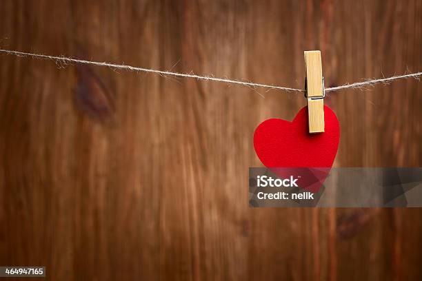 Red Heart Hanging On Wooden Background Stock Photo - Download Image Now - Abstract, Backdrop - Artificial Scene, Brown