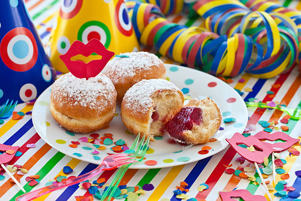 istock Fresh beignets filled with jelly served on colorful plate 464947657