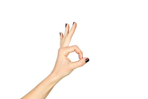 istock female hand making ok sign isolated over white 464949128