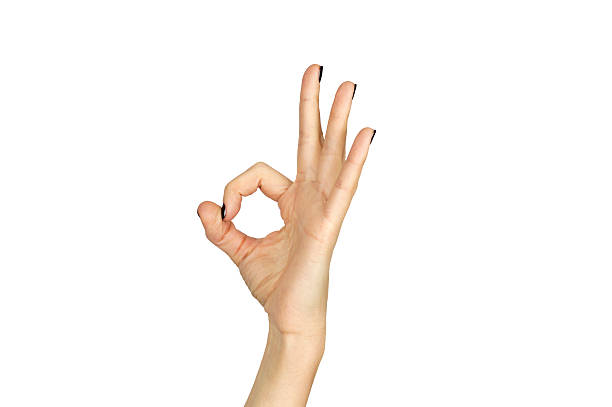 istock female hand making ok sign isolated over white 464949130