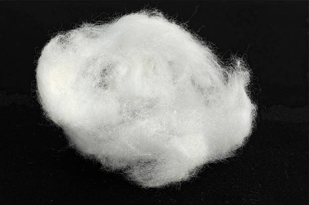 white cotton on black White cotton wool black background cotton ball photos stock pictures, royalty-free photos & images