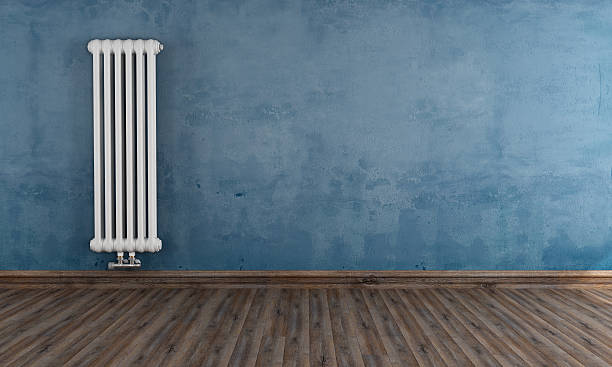 istock Grunge room with vertical radiator 464950465