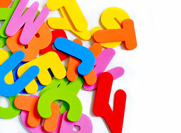 pile of colofrul letters of the English alphabet stock photo
