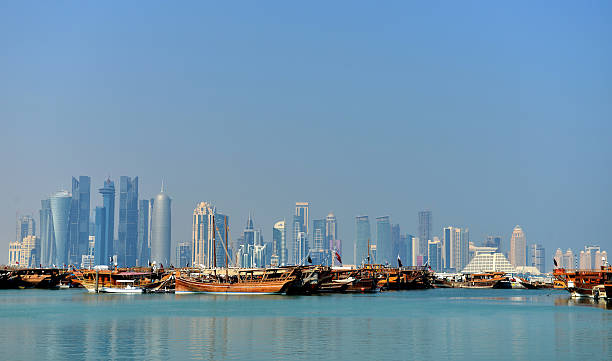 istock Dhows and Doha skyline - Doha Qatar 464959336
