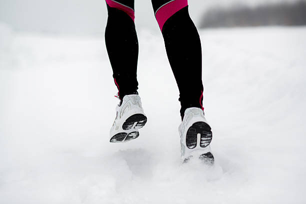 istock Winter running woman 464961155