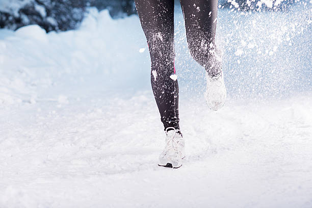 istock Winter running woman 464961173