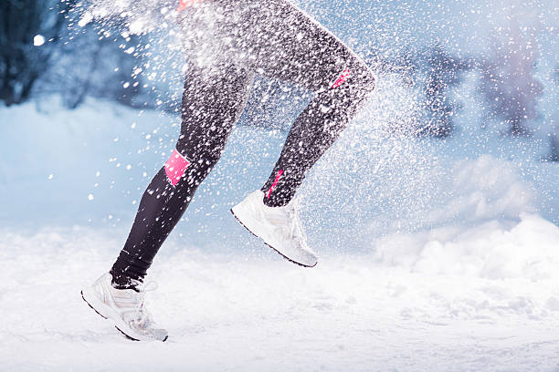 istock Winter running woman 464961213