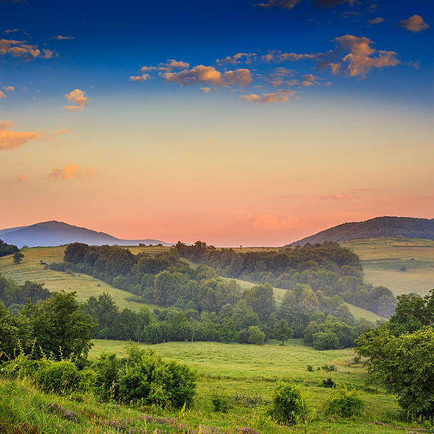 istock cold fog on hot sunrise in mountains 464961323