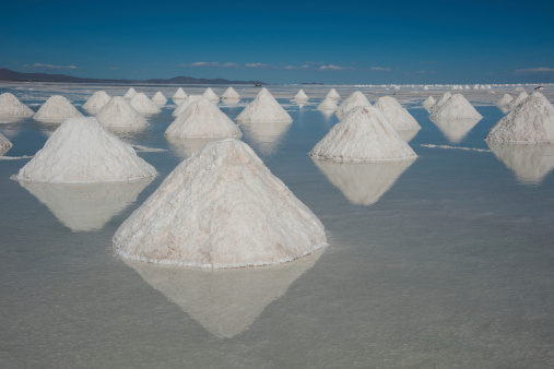 Piles of salt at Salar de Uyuni. Salar de Uyuni is the world's largest salt flat, located in Bolivia.