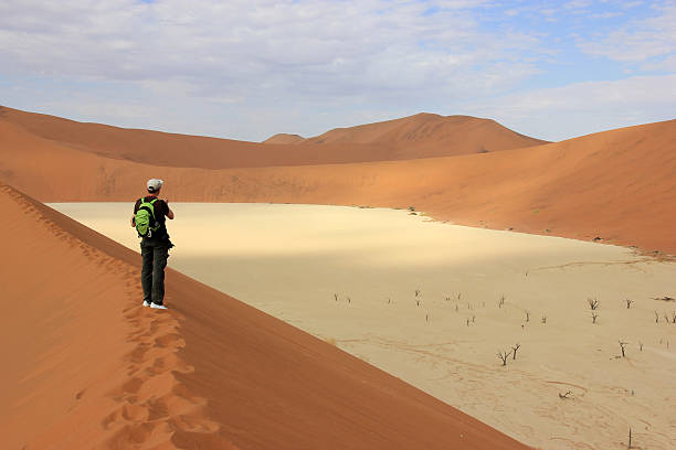 istock Tourist in the desert 464962194