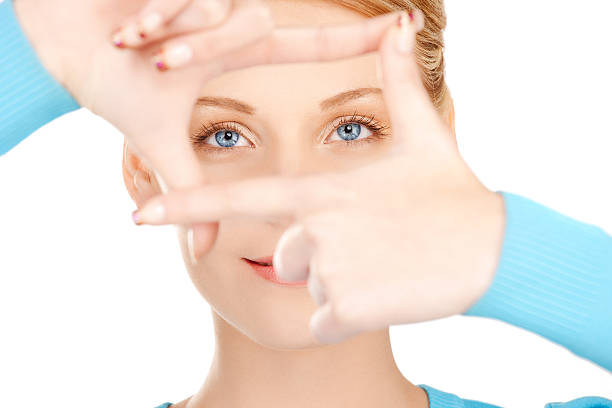 istock woman creating a frame with fingers 464963351