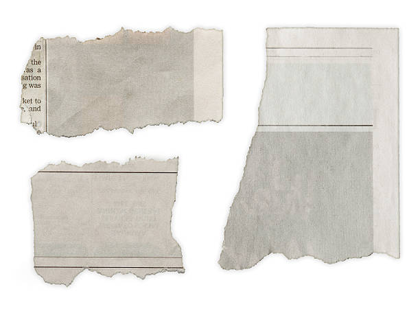 istock 3 pieces of torn newspaper in English 464968917