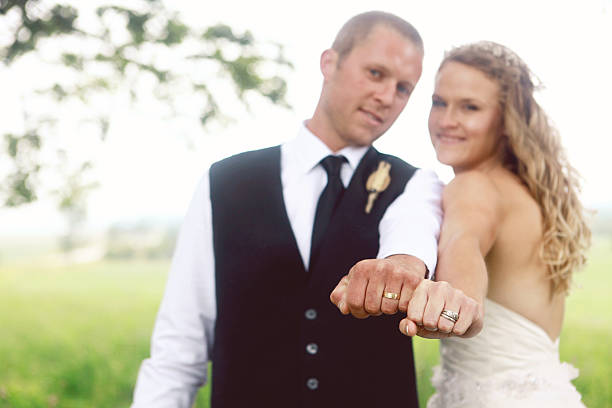 istock Bride and Groom Showing Wedding Rings 464969352