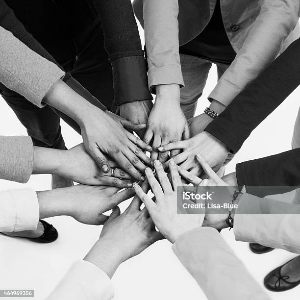 Stacking Hands Stock Photo - Download Image Now - 2015, Adult, Group Of People