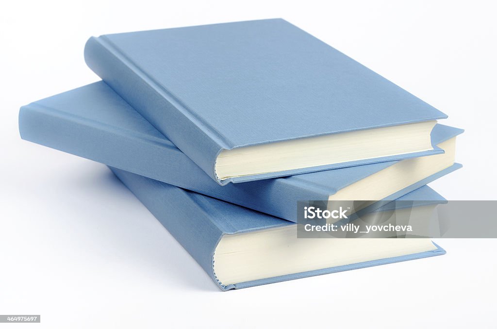 Drei blaue Bücher auf einem weißen Hintergrund. - Lizenzfrei Akademisches Lernen Stock-Foto