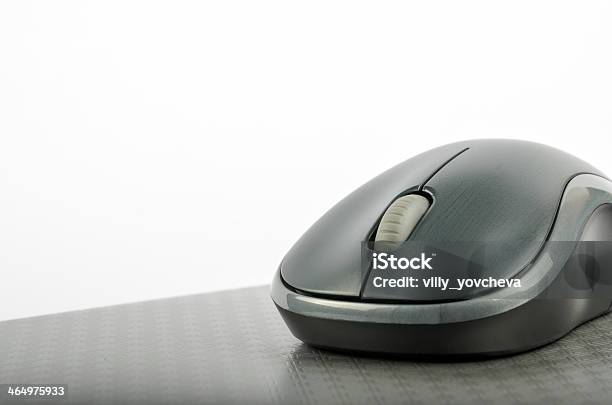 Wireless Computer Mouse On A Metallic Gray Background Stock Photo - Download Image Now